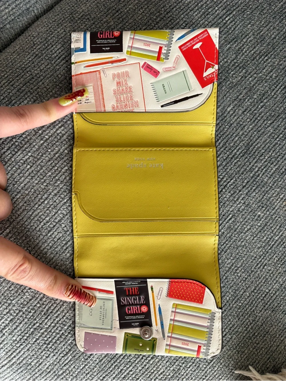 kate spade multicolor book-print compact wallet